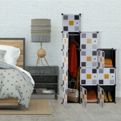 Relaxdays Scaffale Componibile, 8 Scomparti, 2 Aste Appendiabiti, Scarpiera Modulare, HLP: 145x110x37 Cm, Nero Colorato 8 Relaxdays Scaffale Componibile, 8 Scomparti, 2 Aste Appendiabiti, Scarpiera Modulare, HLP: 145x110x37 Cm, Nero Colorato -Cameretta Per Bambini 51983929 2