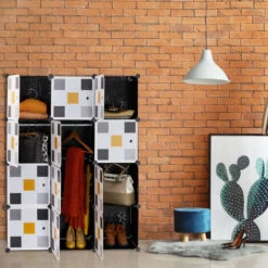 Relaxdays Scaffale Componibile, 8 Scomparti, 2 Aste Appendiabiti, Scarpiera Modulare, HLP: 145x110x37 Cm, Nero Colorato 11 Relaxdays Scaffale Componibile, 8 Scomparti, 2 Aste Appendiabiti, Scarpiera Modulare, HLP: 145x110x37 Cm, Nero Colorato -Cameretta Per Bambini 51983929 5